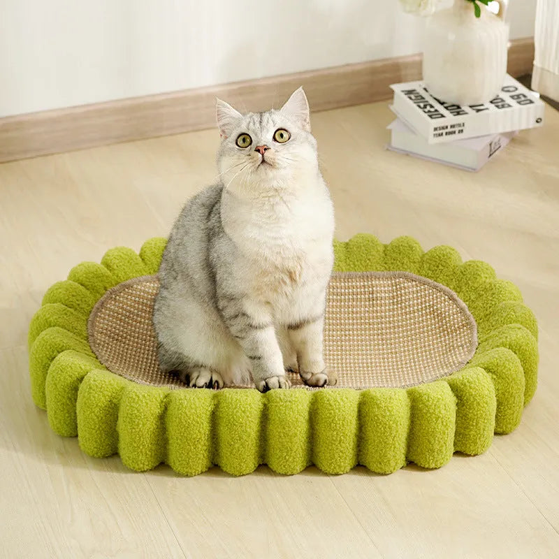 Green oval sisal cat scratching pad bowl serving as a cat bed and furniture protector