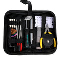 Black plastic and metal guitar repair tool kit with case for instrument maintenance