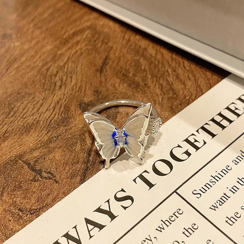 Creative Chinese butterfly women's copper ring with dripping oil treatment process in simple style.