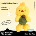 Brown bear plush cat toy with a bell, next to a mint ball, showing its 15cm height.