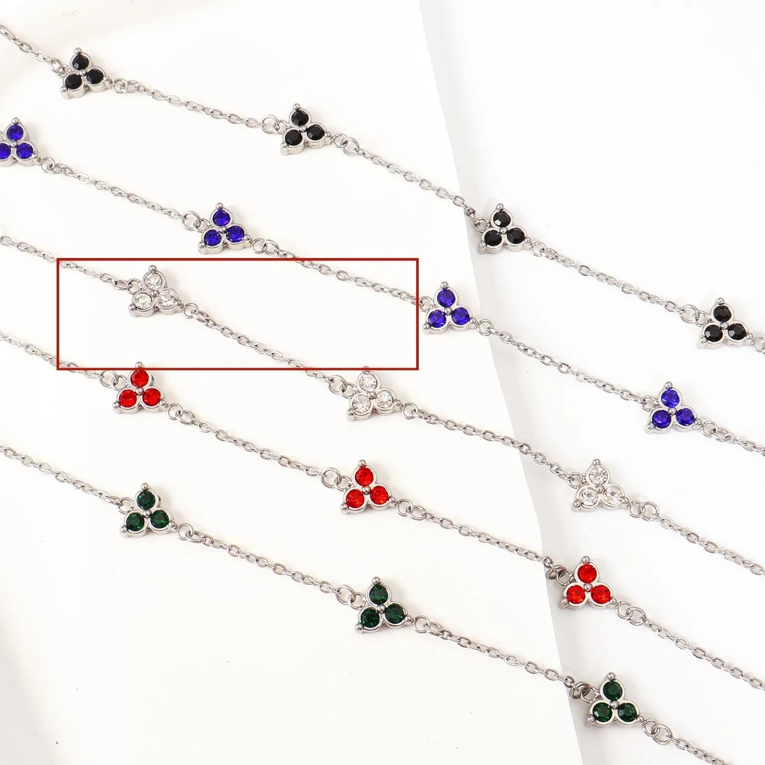Women's geometric bracelet with triangular diamond cluster in gold or steel stainless steel with coloured stones