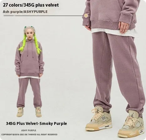 Men's solid colour cotton velvet casual sweatpants with elasticated waist and ankle cuffs.