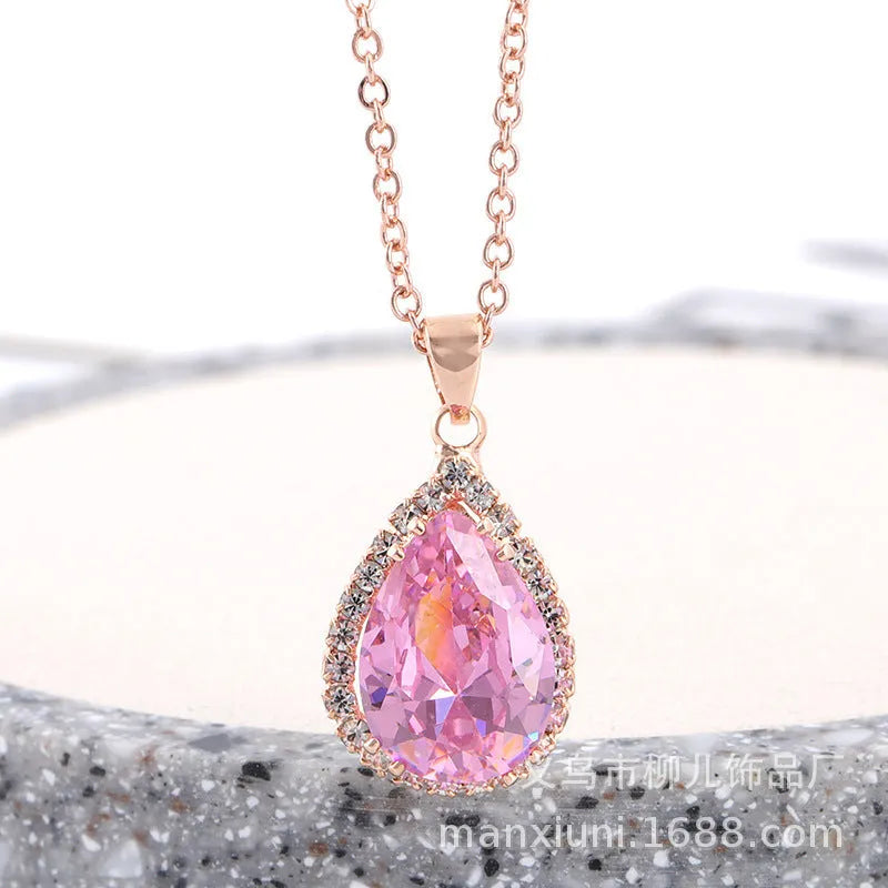 Rose gold pink drop shape women's necklace with geometric rhinestone detailing and alloy construction