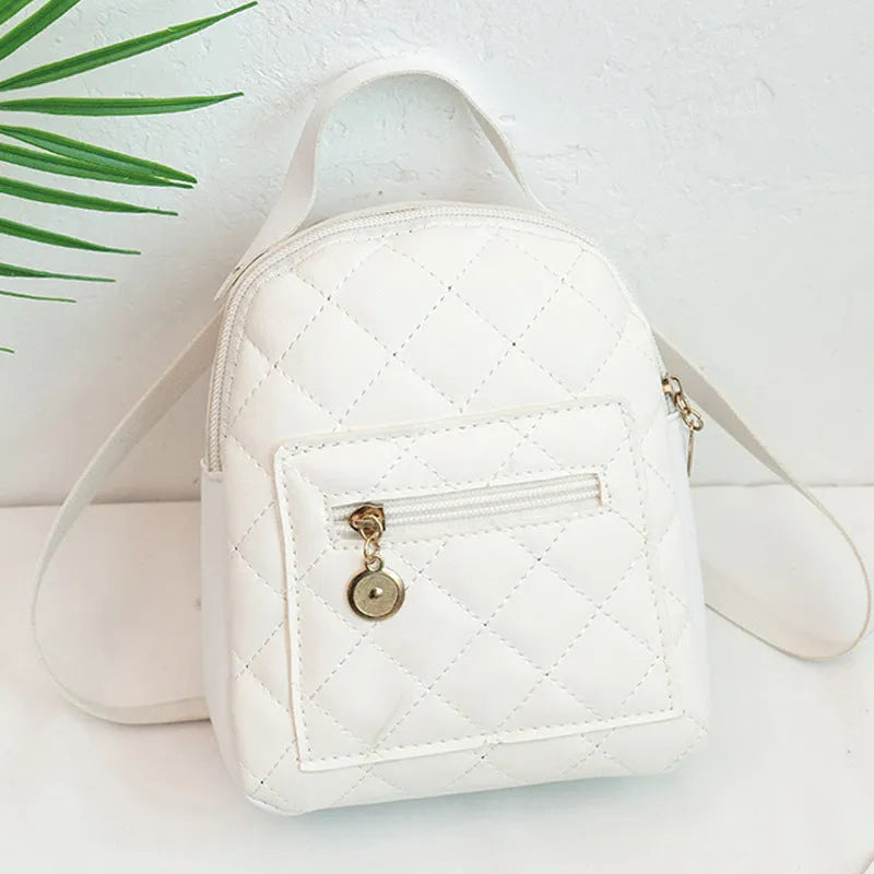 Hard shell square girls backpack with embroidery in black, pink, or white colours.
