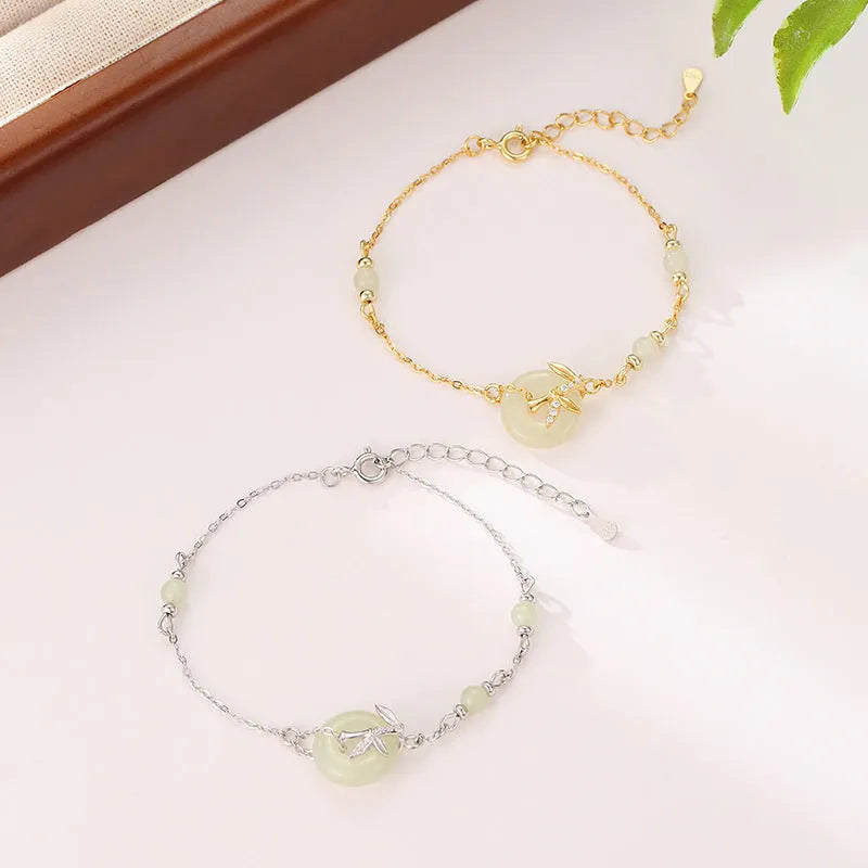 Women's Hetian Jade safety buckle bracelet in antique style with peace buckle design on 925 silver