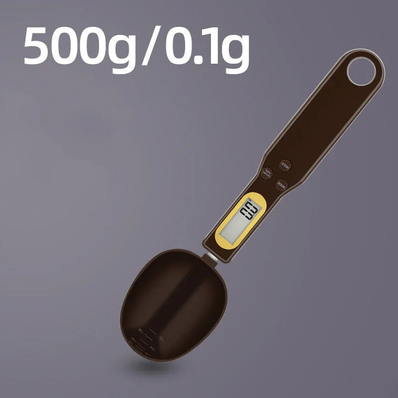 Black electronic measuring spoon scale showing digital display, 23.2cm long.