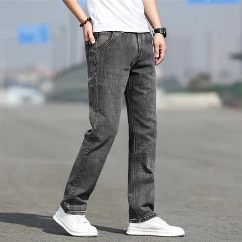 Men's smoky gray straight leg jeans with low waist and zip fly made from elastic rabbit fur fabric
