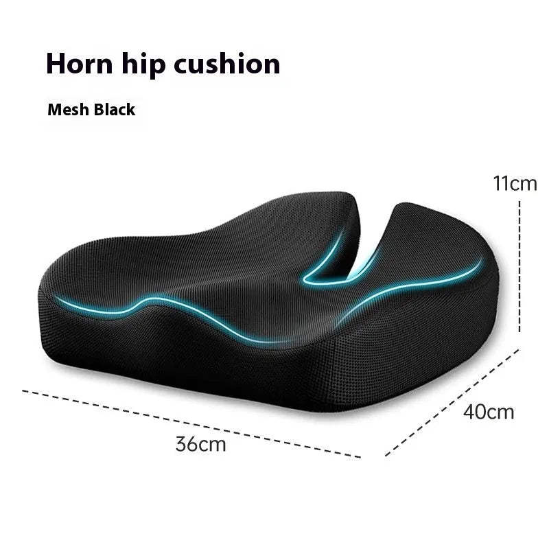 A solid grey memory foam office chair cushion for lumbar support.