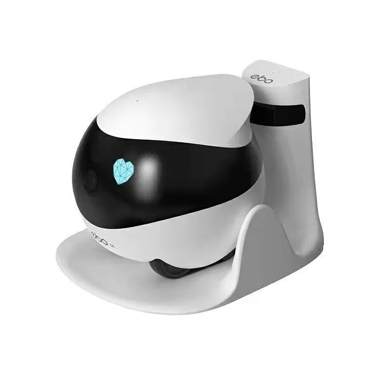 White mobile surveillance robot camera with automatic docking station on wooden floor