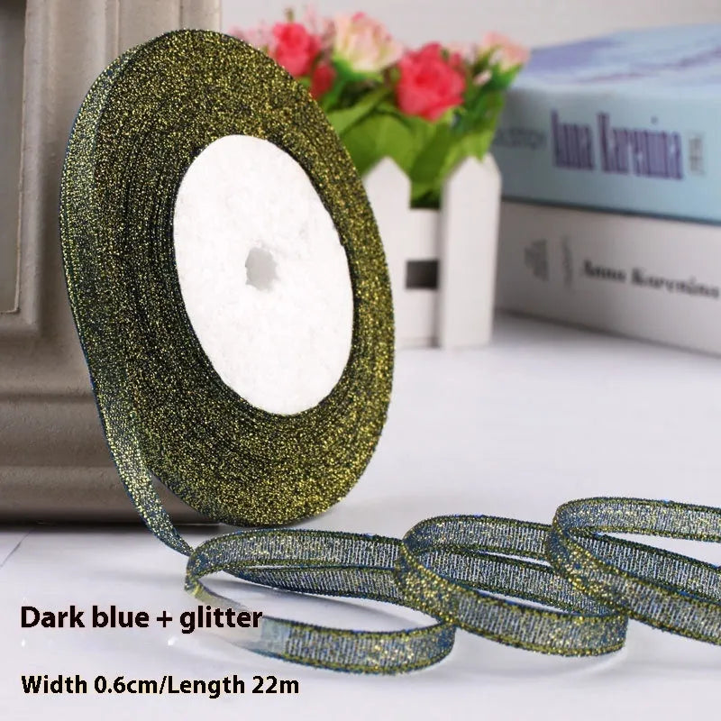 Roll of narrow 0.6cm wide polyester satin ribbon in a choice of colours, showing 22 metre length.