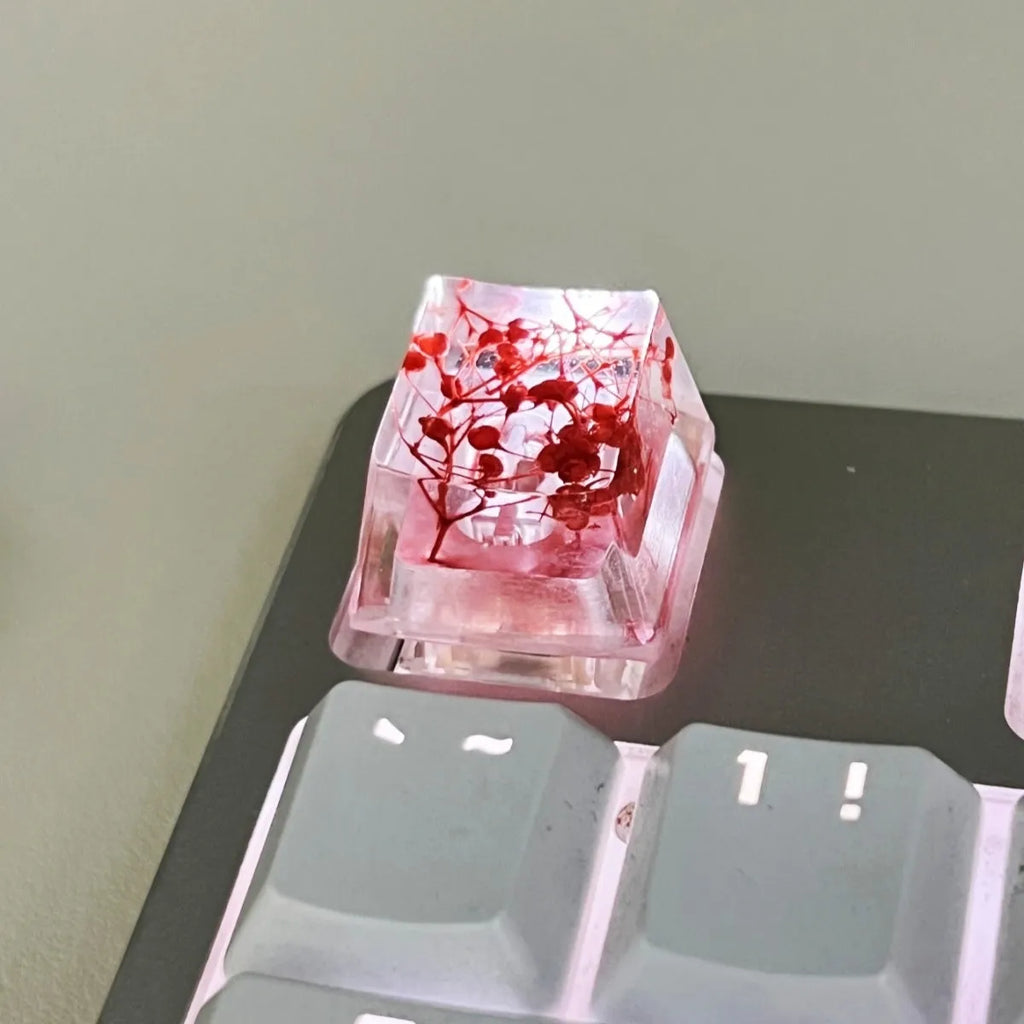 Resin starry sky artisan keycap in green, pink, red, or violet for mechanical keyboard customisation.