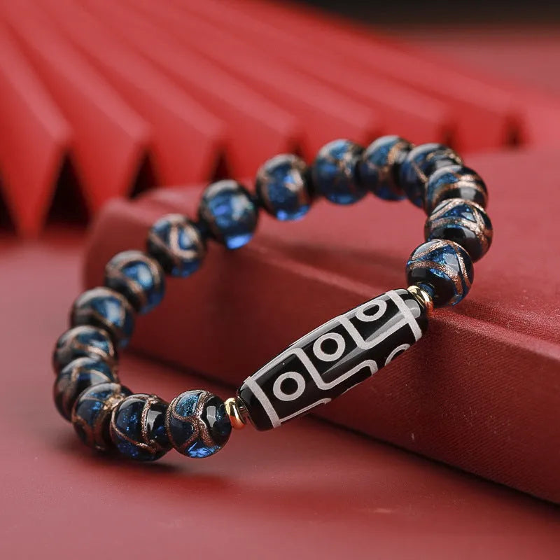 Chinese-style bracelet with colourful glazed beads showing snake patterns, available in 10mm 12mm or 14mm sizes
