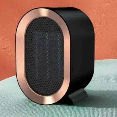 Desktop ceramic fan heater in black with mechanical control knobs and a front grille.