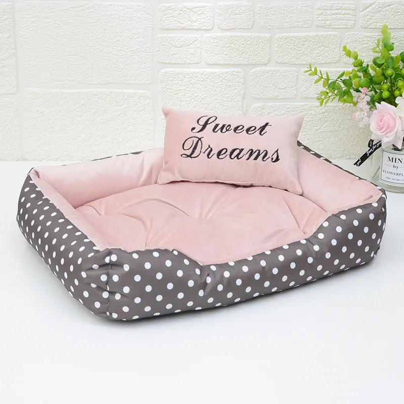 Square polka dot print dog bed with raised sides and a matching embroidery pillow for small dogs.