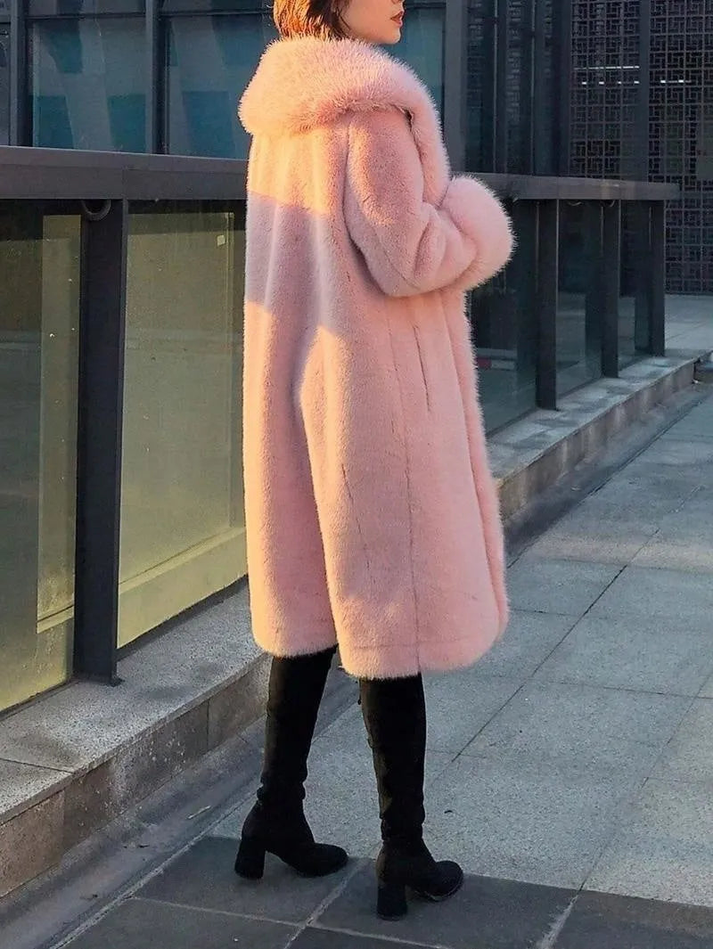 Women's thick grey faux rabbit fur mid-length coat with leather accents and a fur collar.