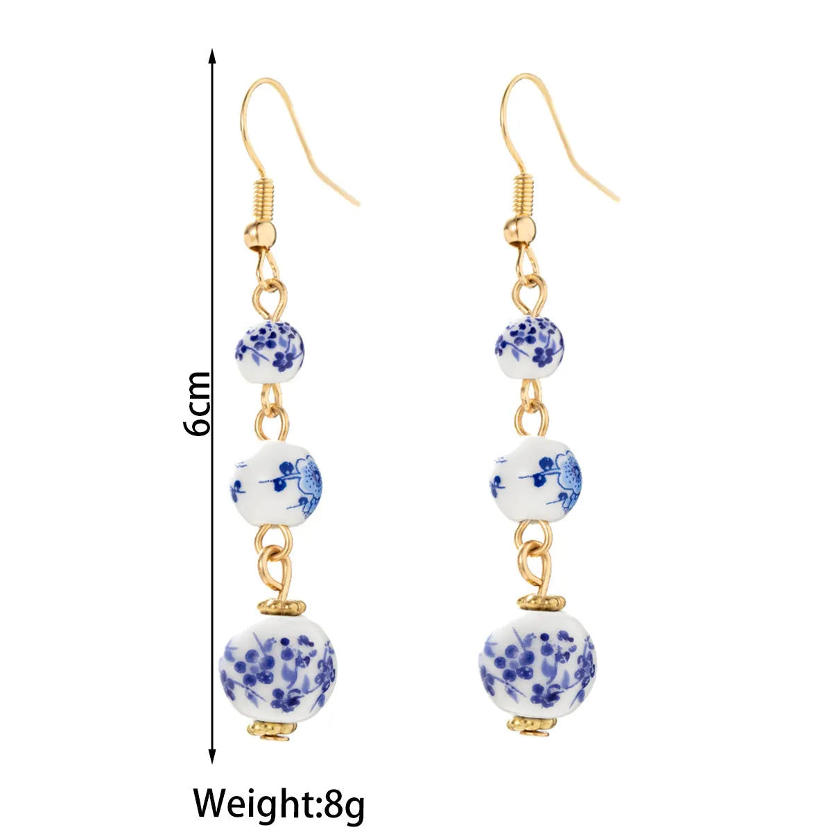 Long blue and white porcelain ceramic bead earrings with alloy frame in a retro Chinese style.