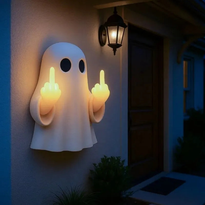 White or black plastic ghost statue night lamp with modern minimalist style for Halloween.