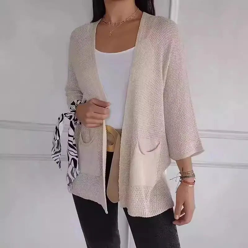 Women's waffle texture cardigan coat in army green with nine-quarter sleeves and pockets.