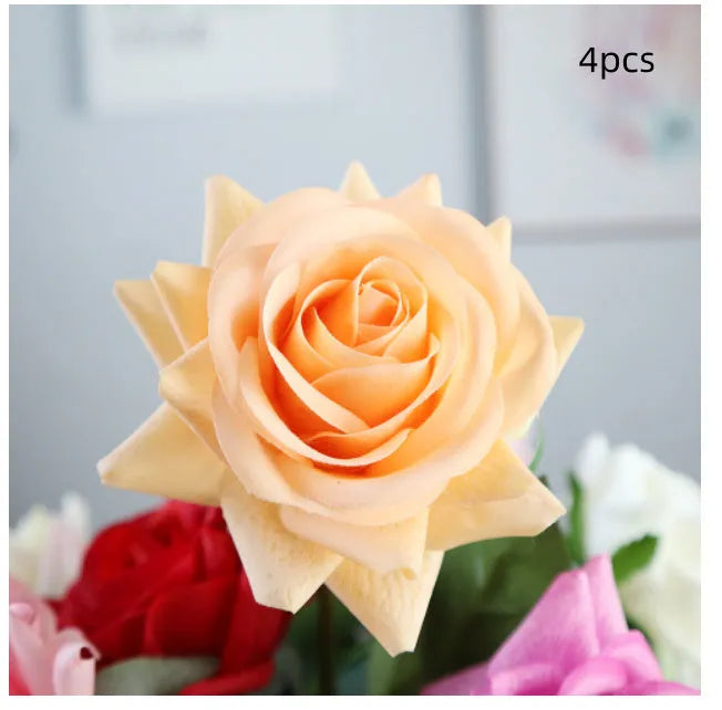 Artificial silk rose bouquet with red fabric flower head and green plastic stem