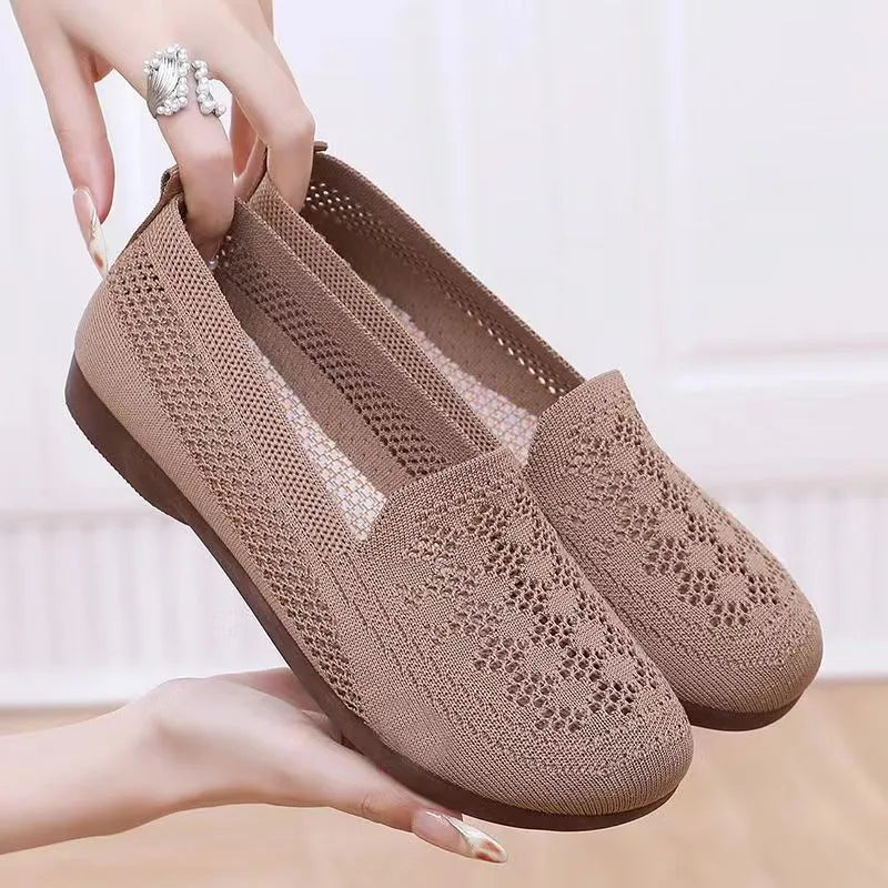 Beige women's low-top mesh casual shoes with a round toe and lightweight PVC sole.