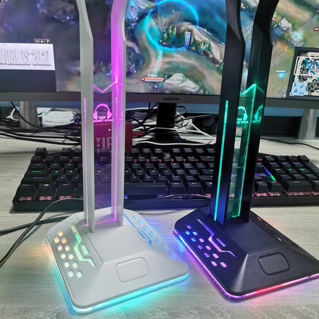 RGB headphone bracket with dual USB ports and customisable lighting on desk with headphones