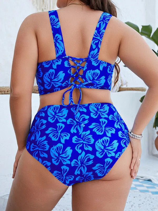 Blue floral print women's split bikini swimsuit on a mannequin.