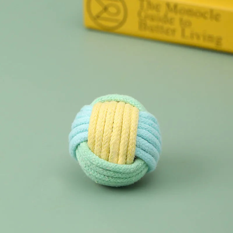 Handmade 5cm plush cotton ball cat toy in multiple colours for teeth grinding and interactive play