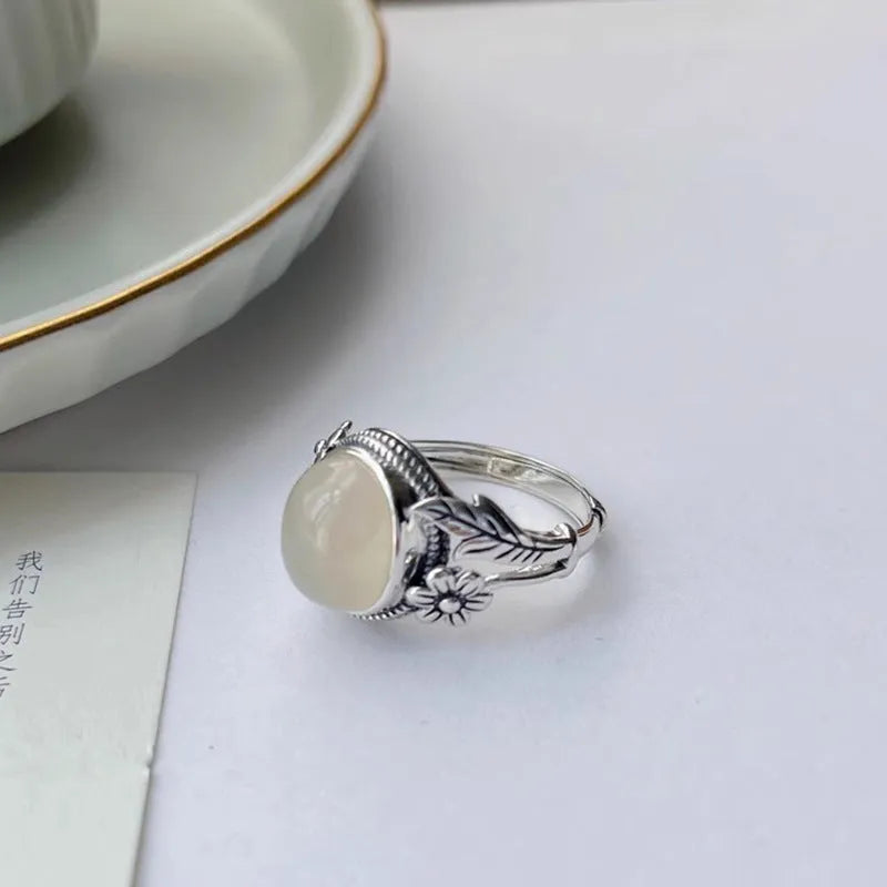 Copper vintage ring with imitation white chalcedony stone and adjustable open-mouth design