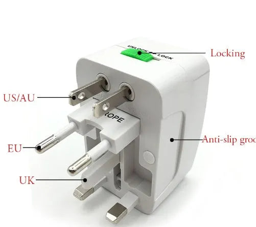 Compact white universal travel plug adapter showing UK plug socket and extendable US, EU, and AU pins