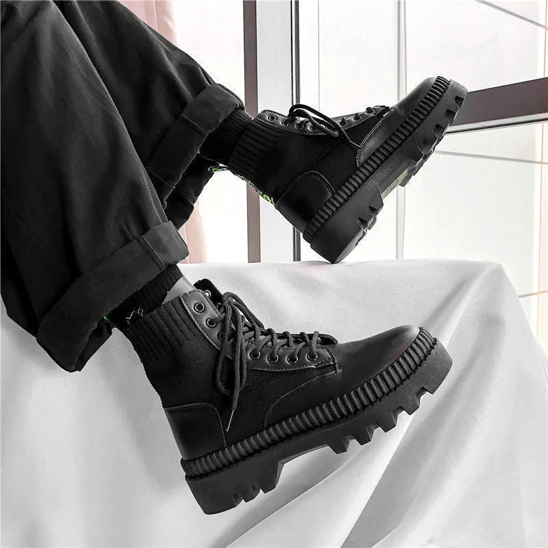 Men's black high-top platform boots with a zip fastener and lace-up detail, made from frosted cowhide leather.