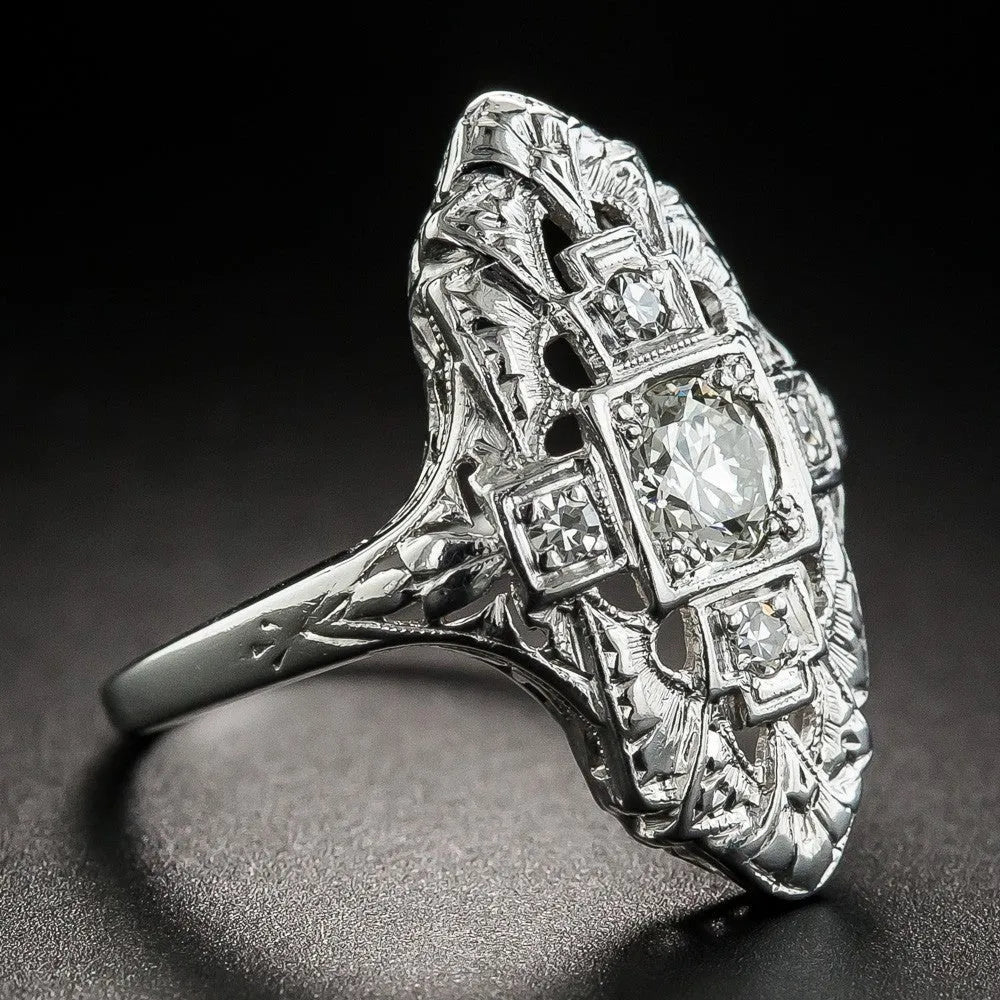 Copper electroplated silver ring with hollow cutout geometry design and diamond-studded details