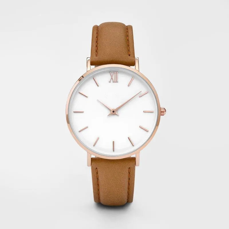 Square-faced quartz watch with an alloy case and PU leather strap on a wrist.