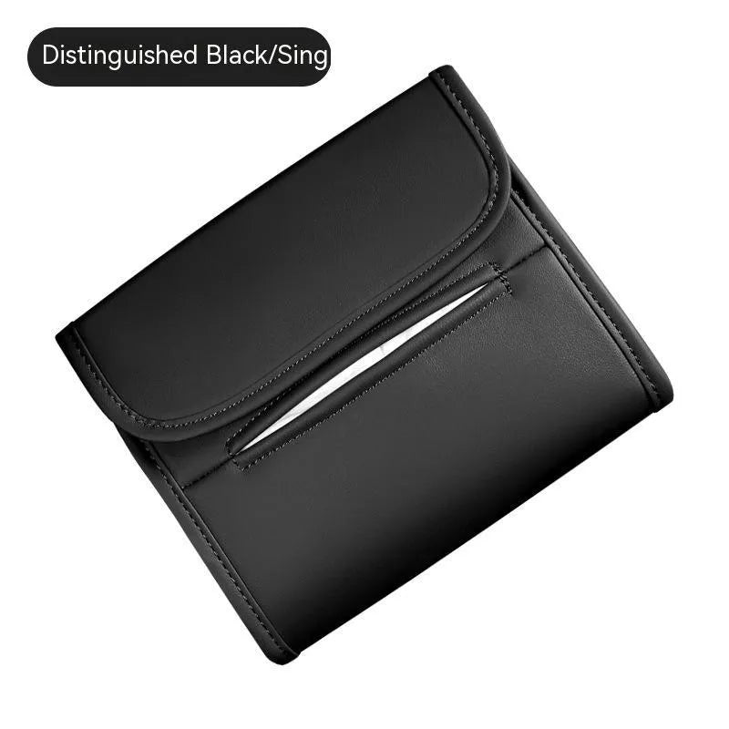 Leather car tissue box mounted on a car sun visor with elastic band strap.