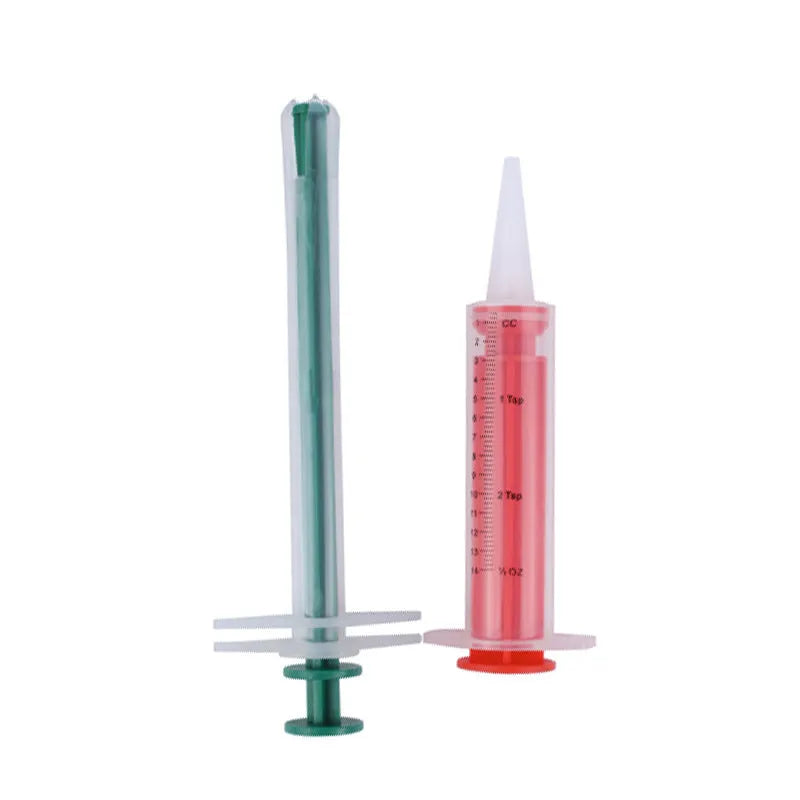 Two soft-tip silica gel pet pill shooters for cats and dogs on a white background