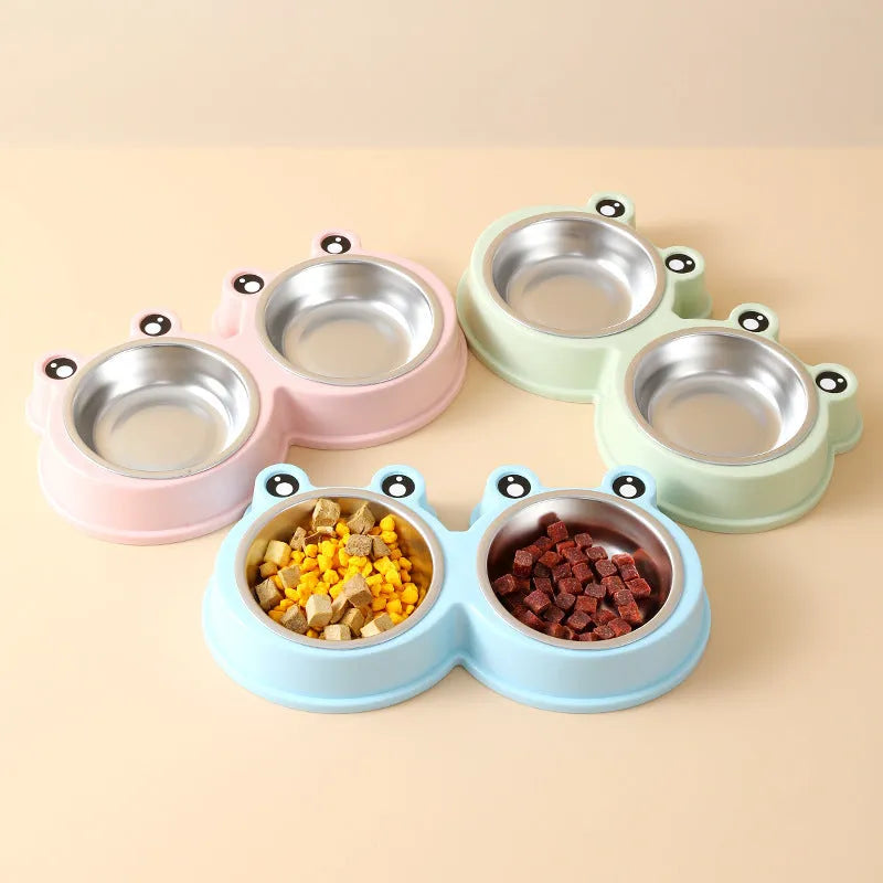 A stainless steel pet bowl with two compartments for water and food, shown in blue.