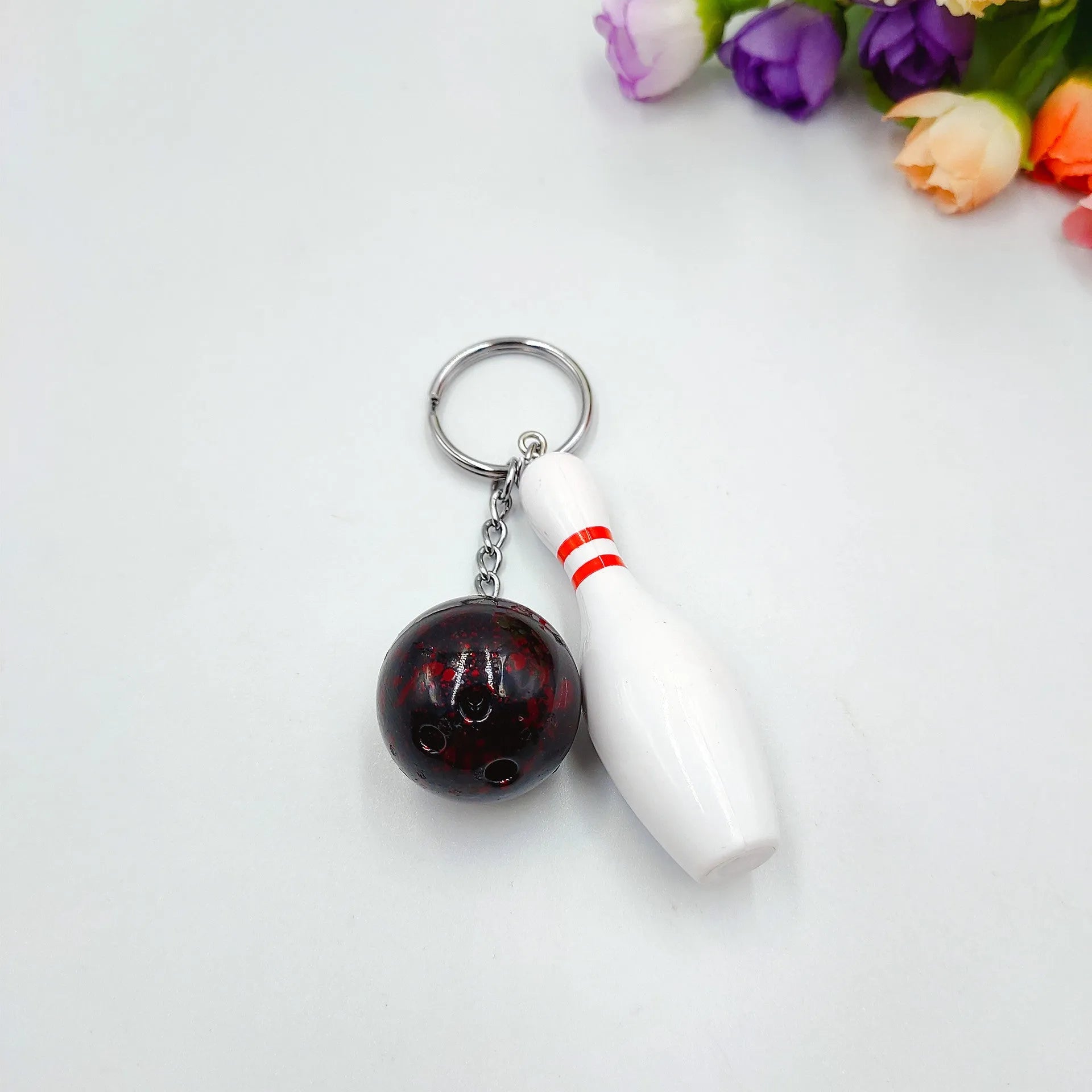 Mini simulation bowling ball keychain pendant in dark red, blue, purple, or green colours