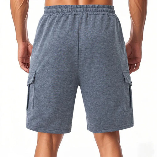 Man's light grey loose-fit cargo shorts made from heavy towel fabric with multiple pockets.