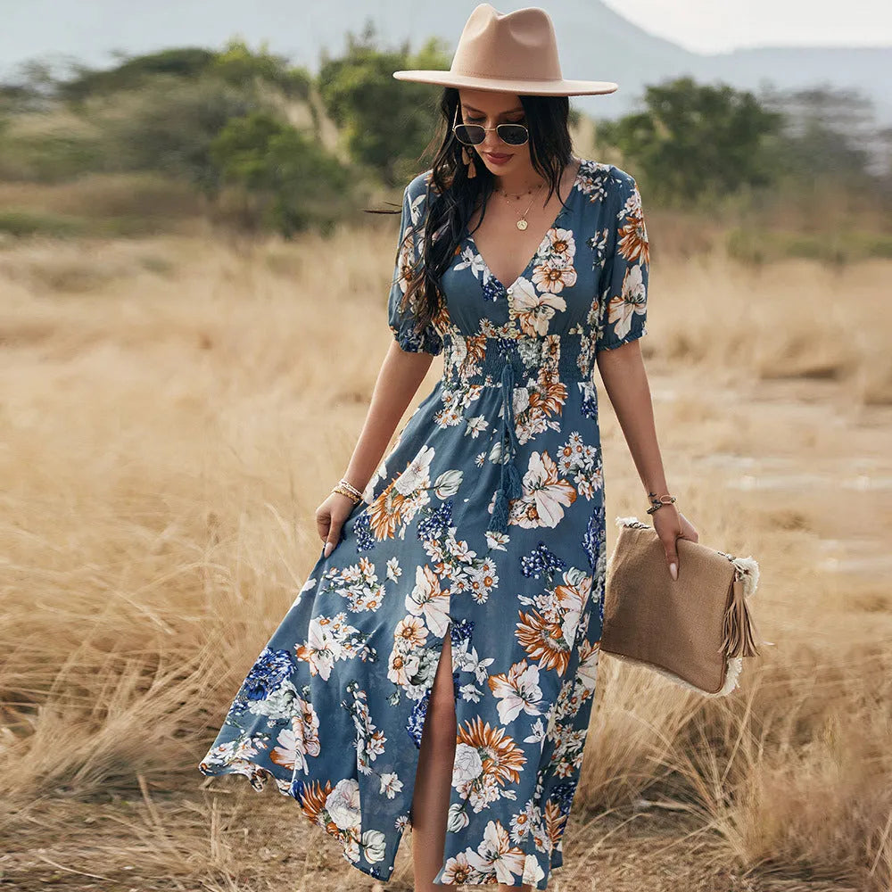 Women's floral print summer dress with V-neck, elastic waist, and large hemline skirt in yellow colour