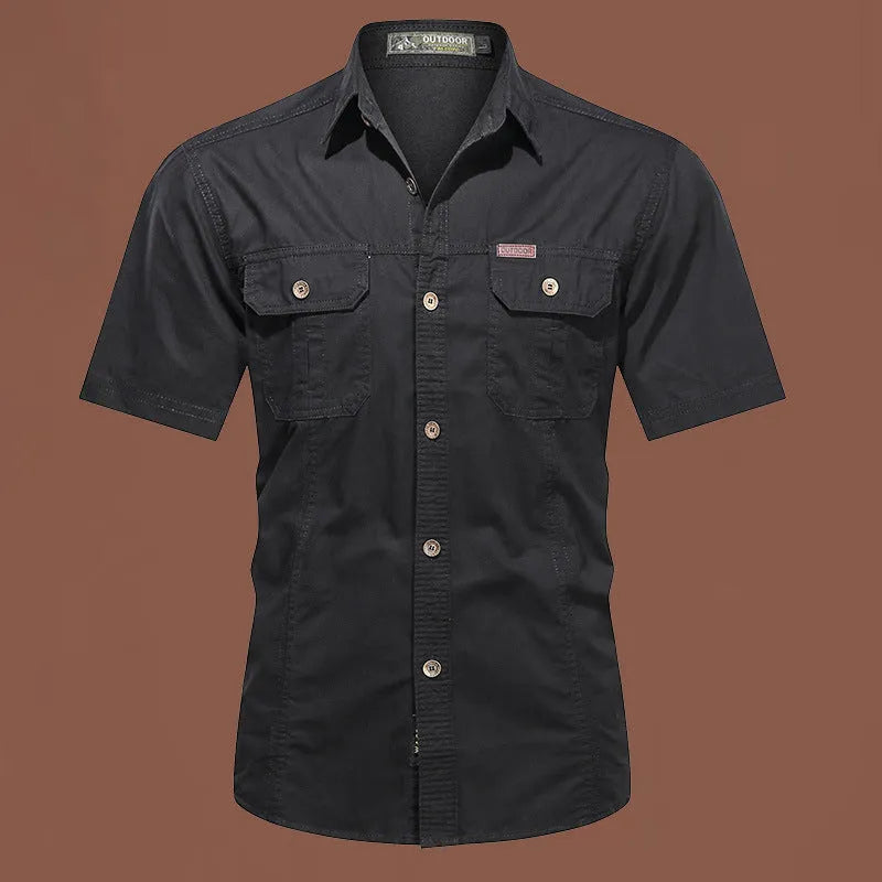Men's short sleeve cotton work shirt in a loose fit, shown in army green colour.
