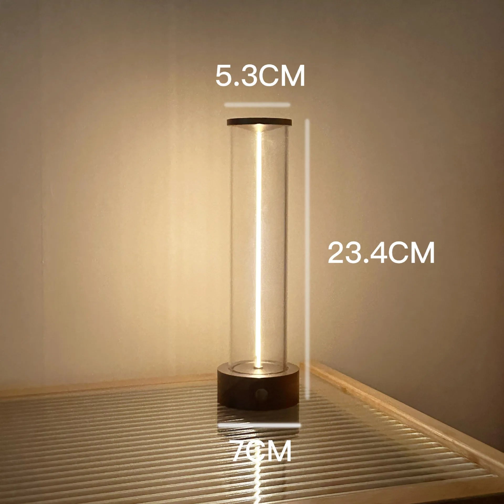 Modern glass and metal LED line light strip with magnetic back for USB-charged night lighting
