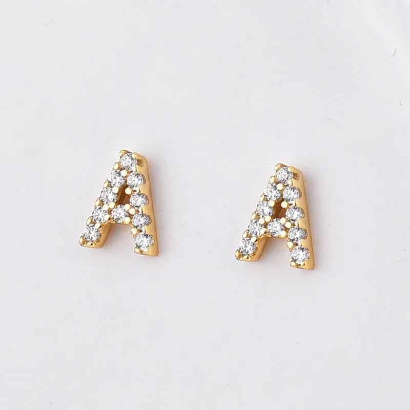 Brass gold plated alphabet letter earrings showing zircon stones on copper base with 26 English letters available
