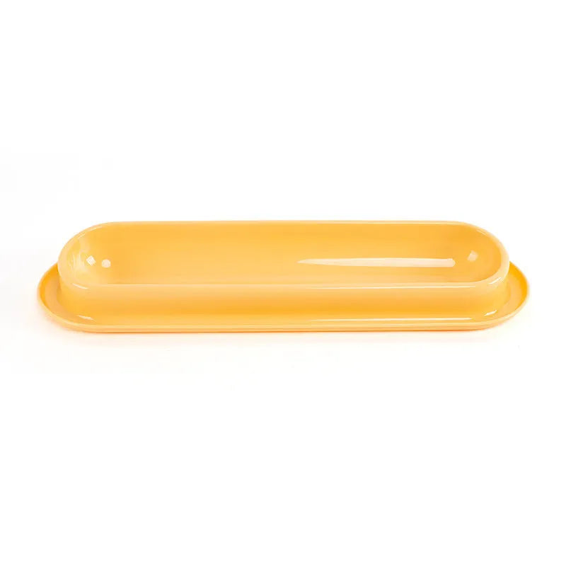 Green leakproof dual pet bowl feeder with non-slip base for dogs and cats.