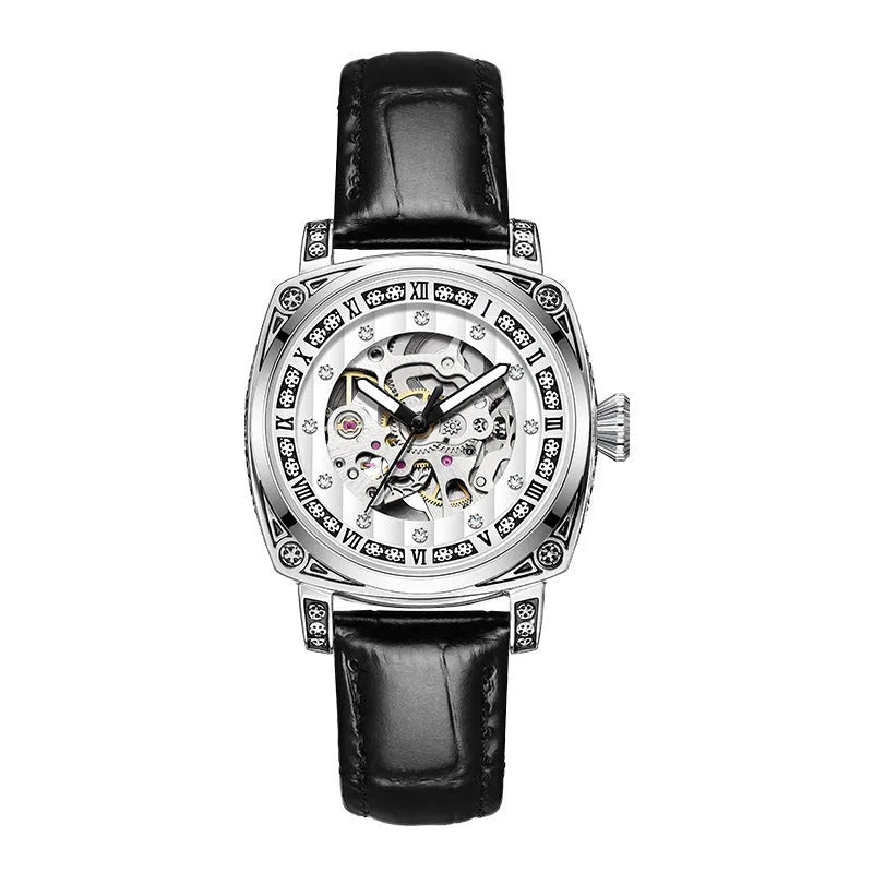 Leather strap mechanical watch with luminous hands on a wrist, showing black dial variant.