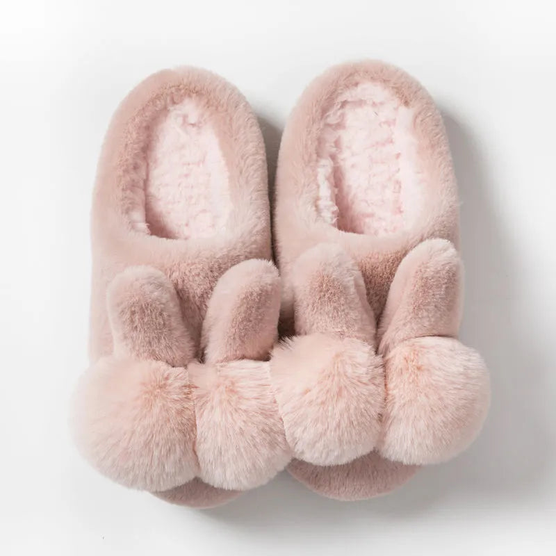 Women's rabbit fur winter slippers with high upper, floral pattern, and bunny-inspired fluffy design