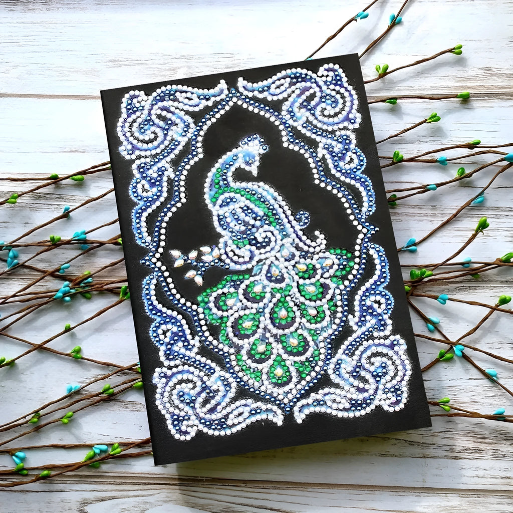 Black A5 diamond painting notebook with peacock design, shaped drills, and OPP packaging