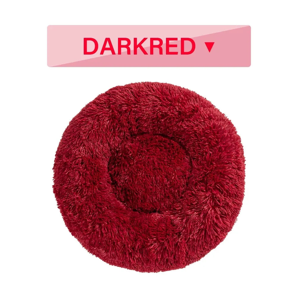 Donut-shaped long plush pet bed with raised sides, shown in a neutral colour.