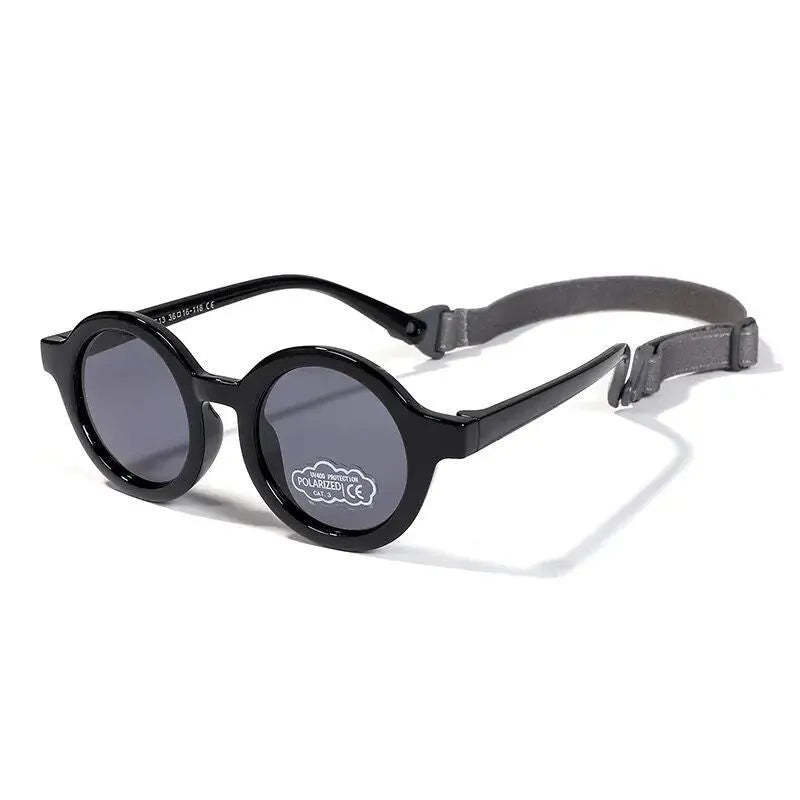 Children's silicone sunglasses with round frame and polarised lenses in multiple colours for 0-3 year olds