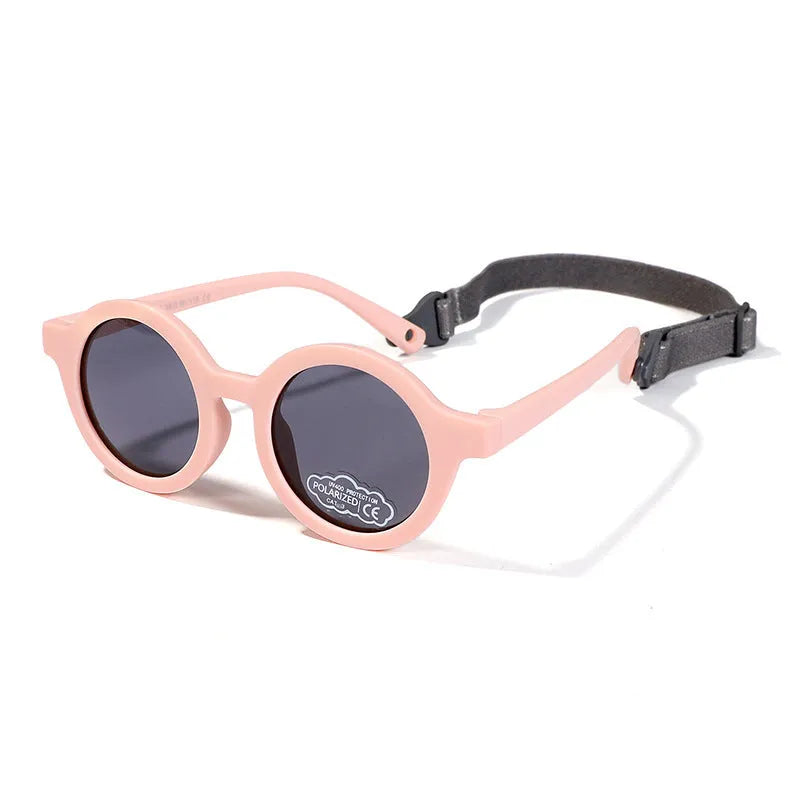 Children's silicone sunglasses with round frame and polarised lenses in multiple colours for 0-3 year olds