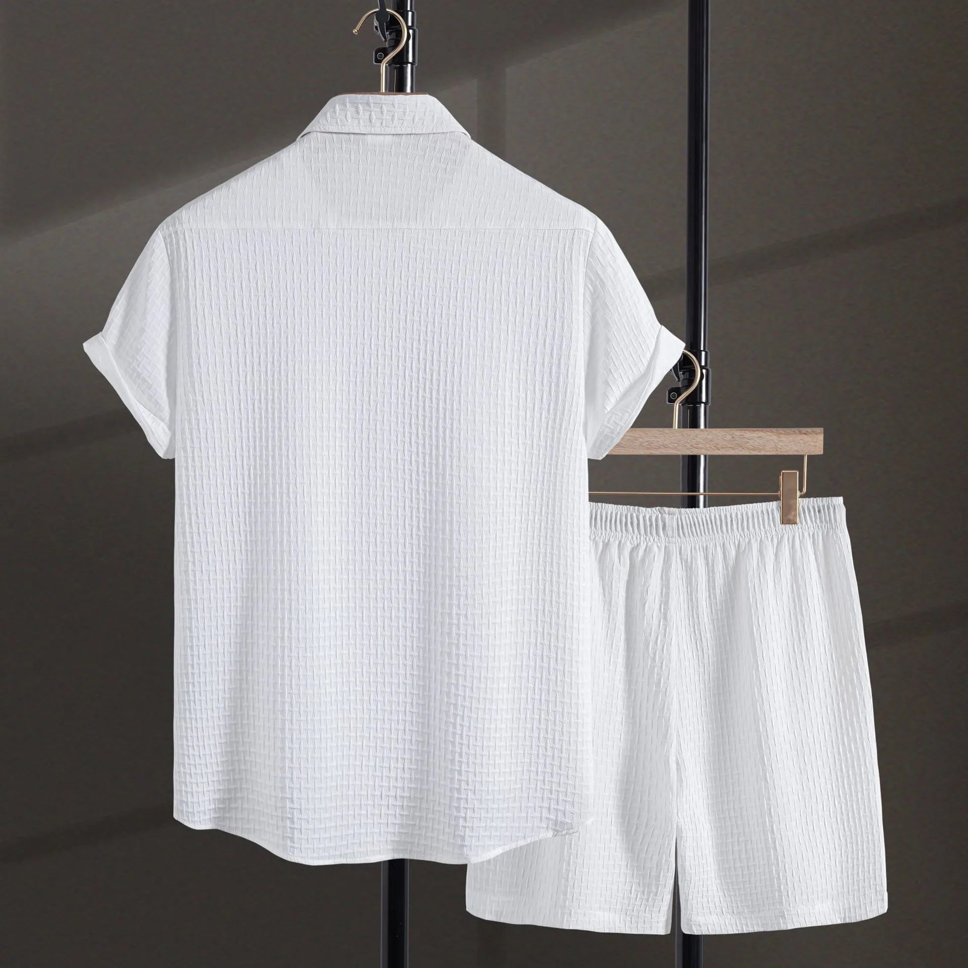 Men's black cotton blend short sleeve shirt and shorts casual suit set on a hanger.