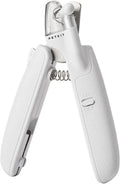 White pet nail clippers with LED light, anti-splash guard, and built-in file on a grey surface